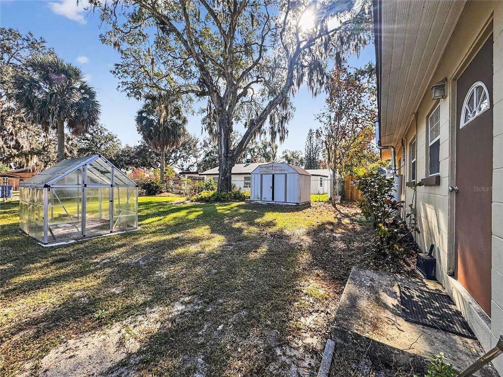 510 North Barrow Avenue Tavares, FL 32778 - Photo 25 of 33 a view of a house with a yard and pathway
