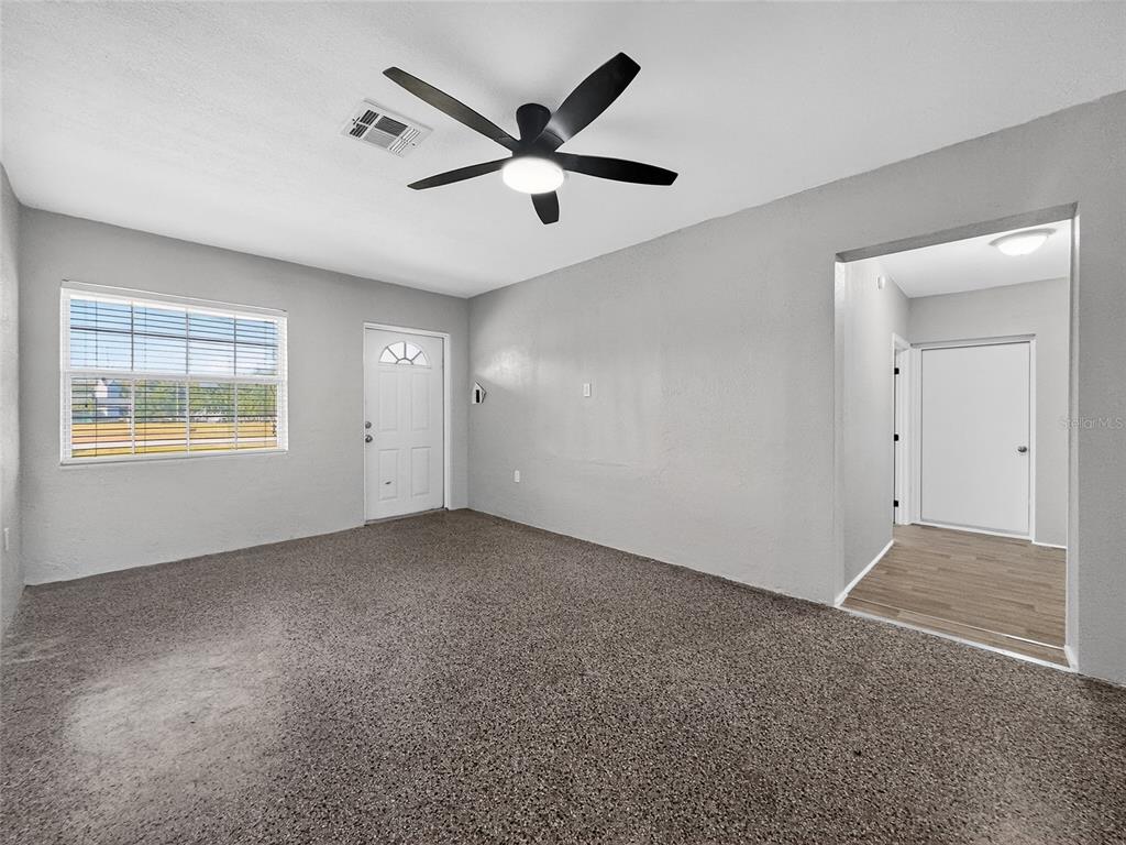 510 North Barrow Avenue Tavares, FL 32778 - Photo 7 of 33 a view of an empty room with a window