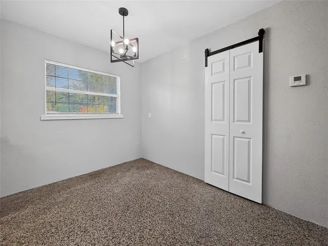 a view of an entryway with window