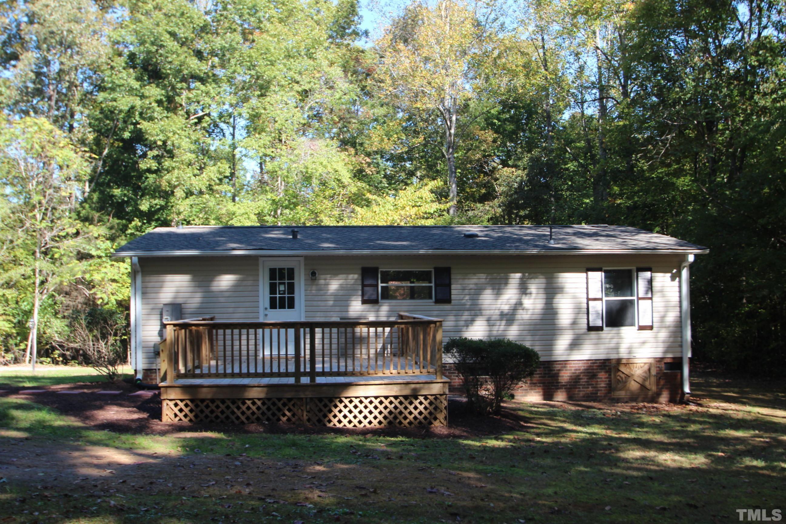 1075 Stoney Mountain Road Rougemont, NC 27572 - Photo 14 of 14 a view of a house with a yard