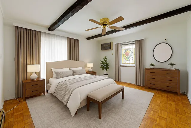 a bedroom with a bed and a dresser