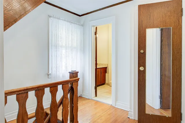 a view of a porch with wooden floor