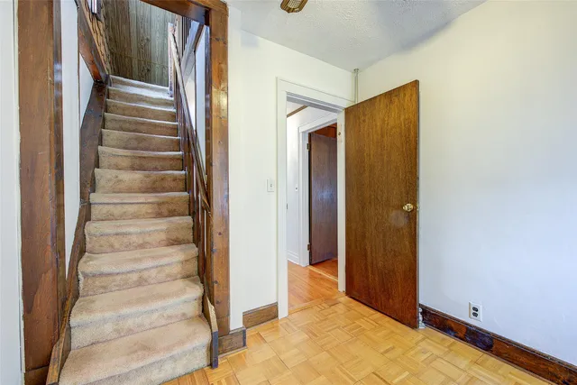 a view of an entryway with stairs