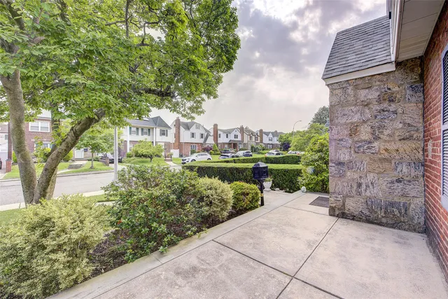 a view of a garden with pathway