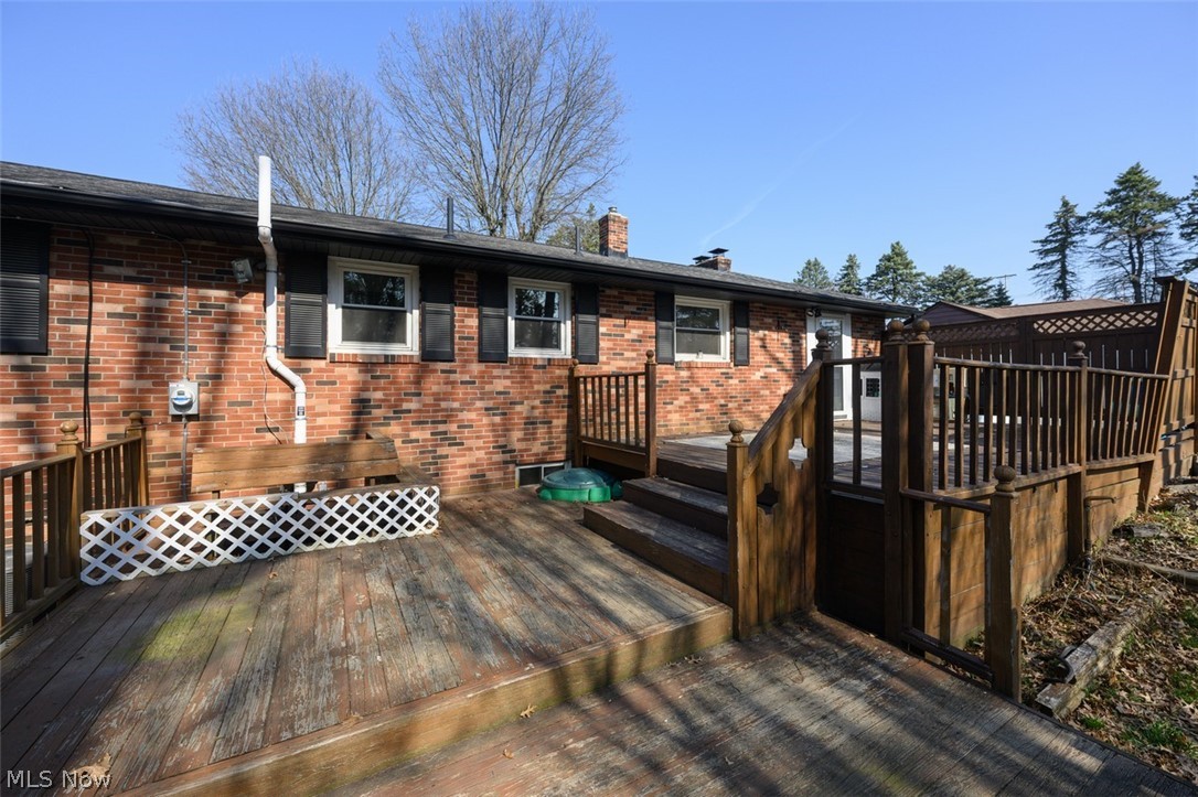 5210 Sibila Road Northwest Canton, OH 44718 - Photo 30 of 36 Back of home with deck overlooking private backyard