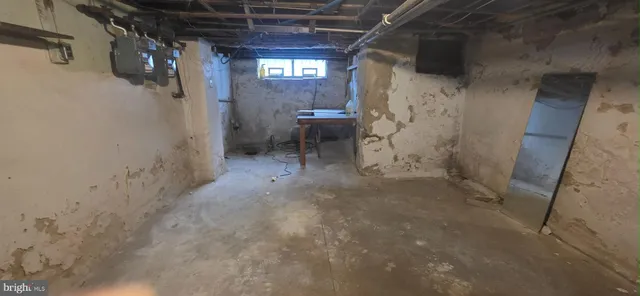 a view of a hallway with a chair