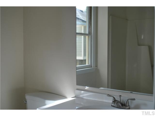 3322 Mill Run Raleigh, NC 27612 - Photo 11 of 16 a view of an empty room and window