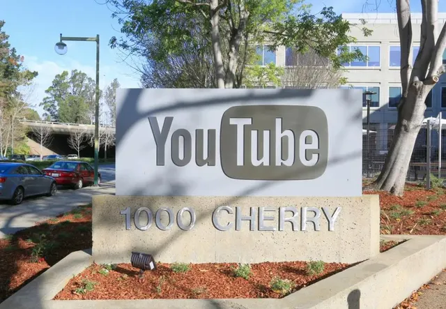 a outdoor space with a couple of cars parked on road