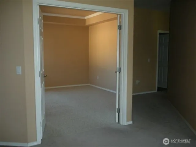 an empty room with closet