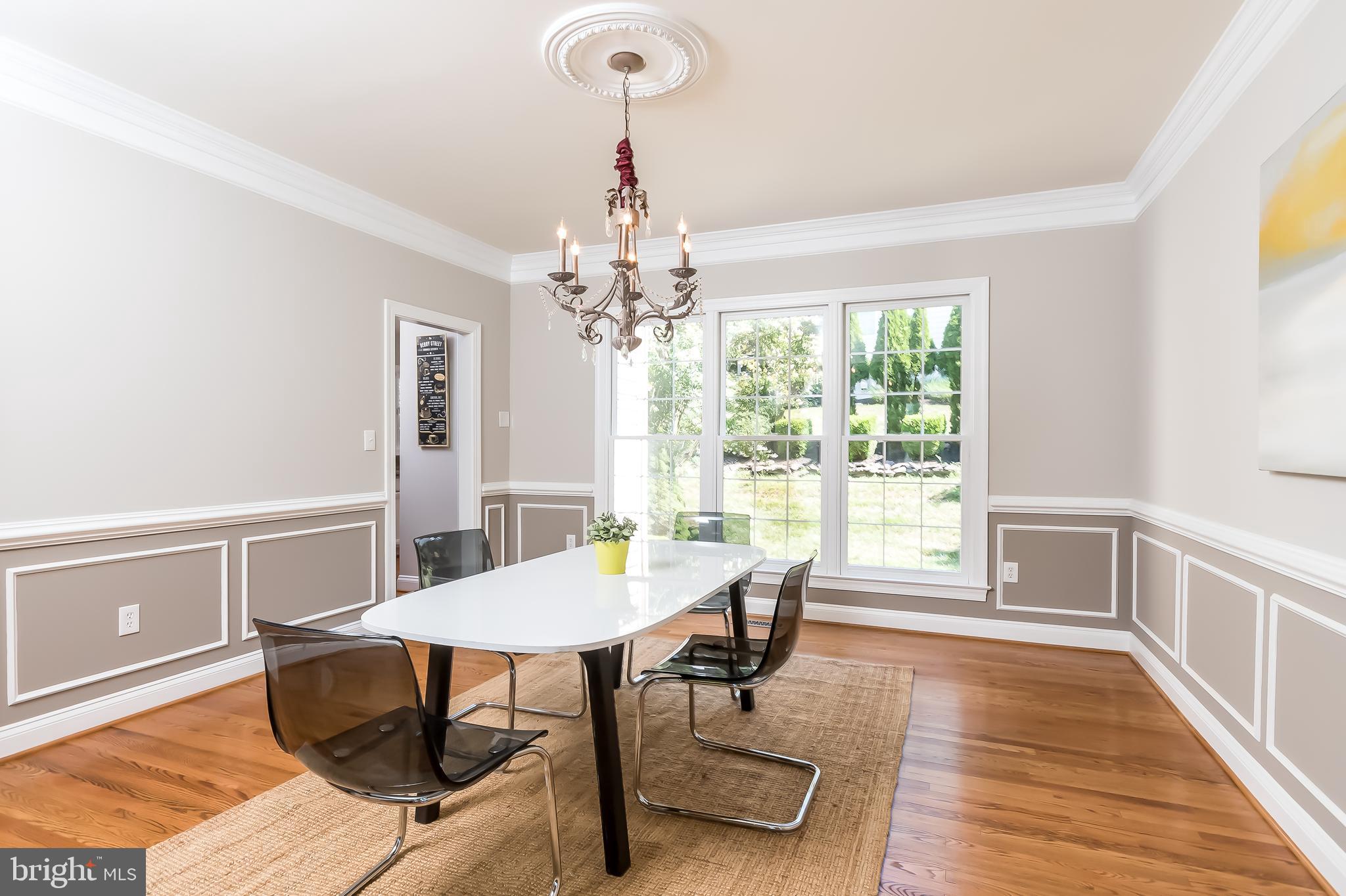 43268 Hillhead Place Leesburg, VA 20176 - Photo 11 of 53 a view of a dining room with furniture window and wooden floor