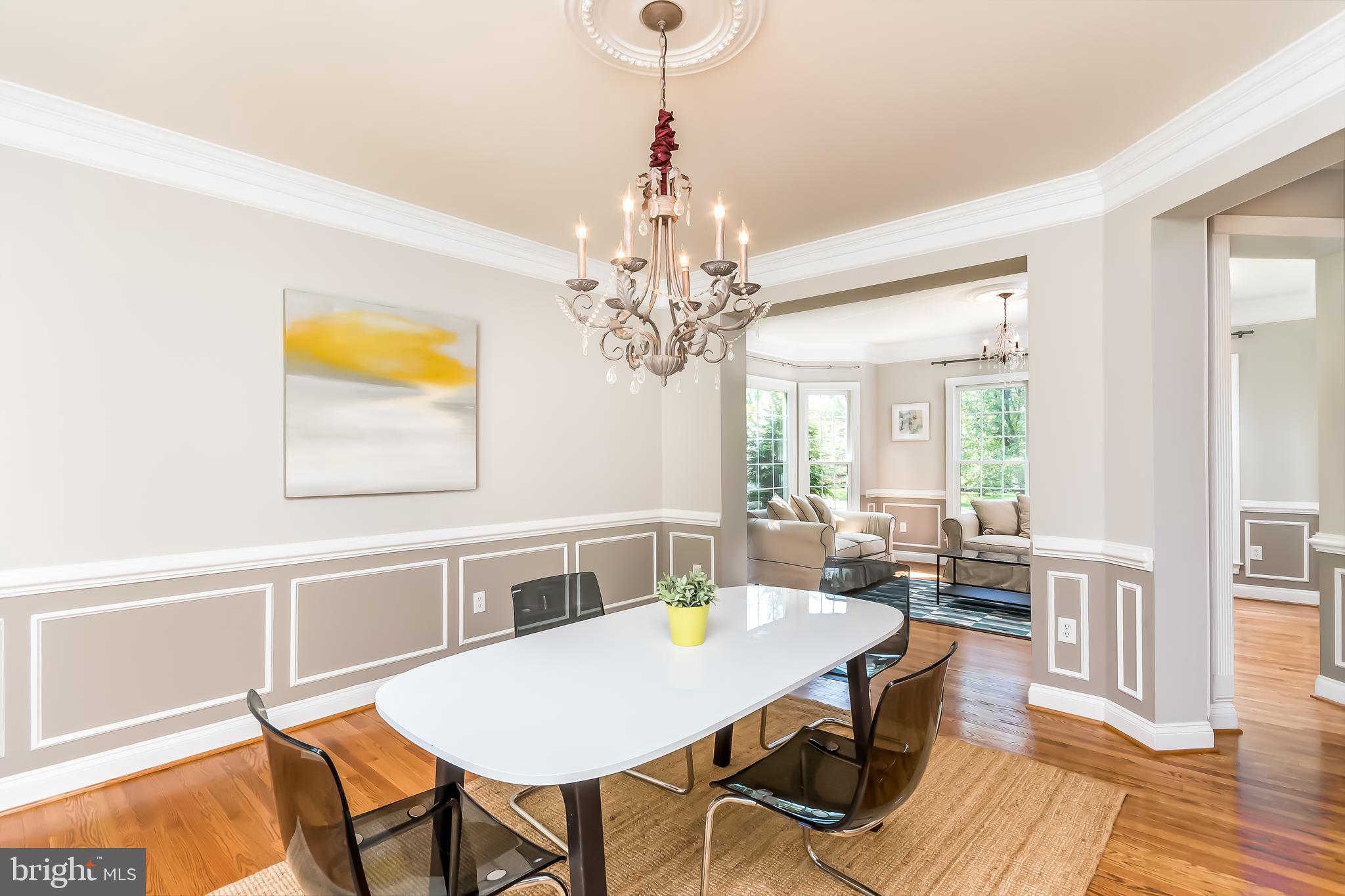 43268 Hillhead Place Leesburg, VA 20176 - Photo 12 of 53 a view of a dining room with furniture and wooden floor