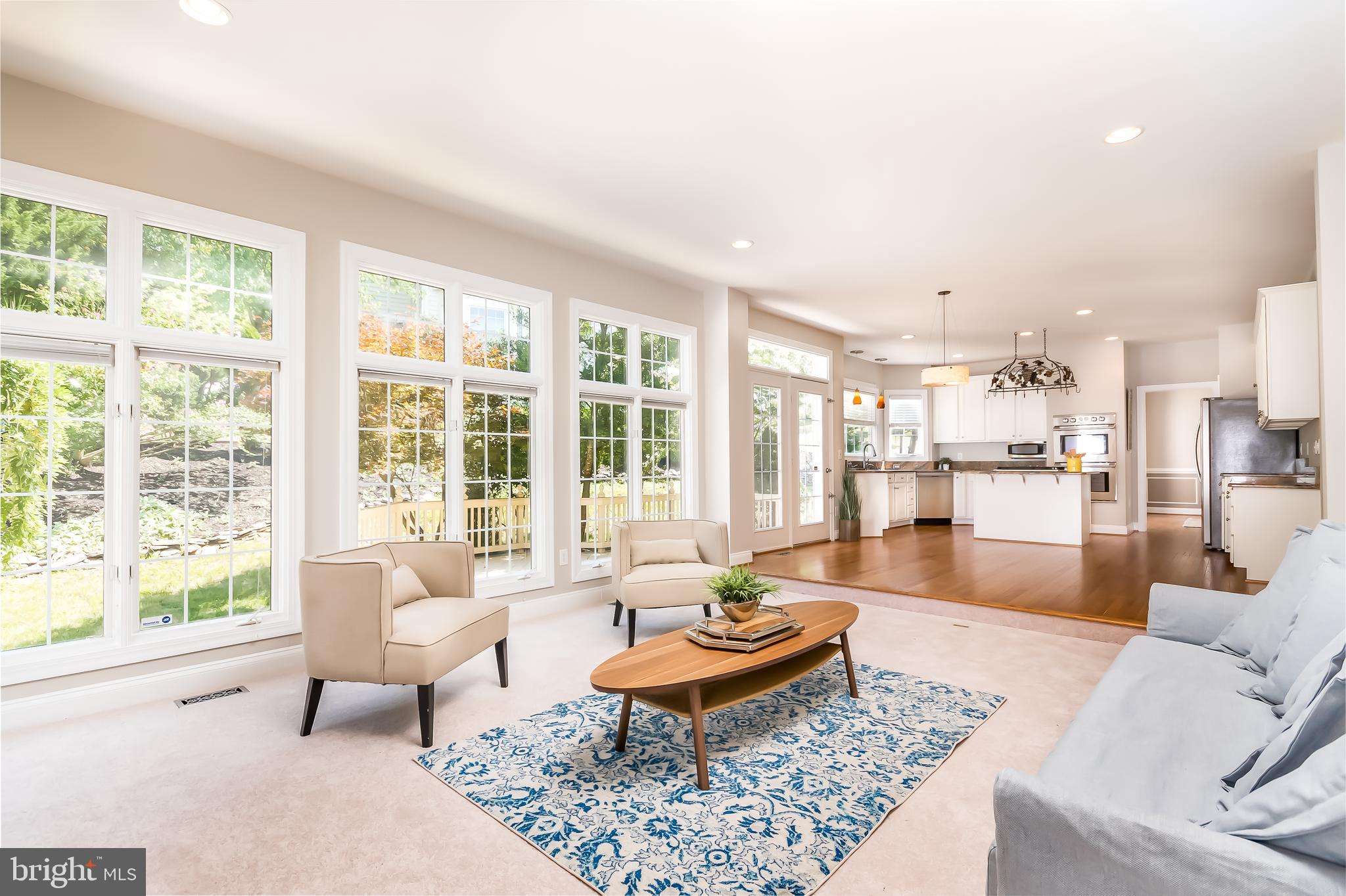 43268 Hillhead Place Leesburg, VA 20176 - Photo 2 of 53 a living room with furniture and a large window