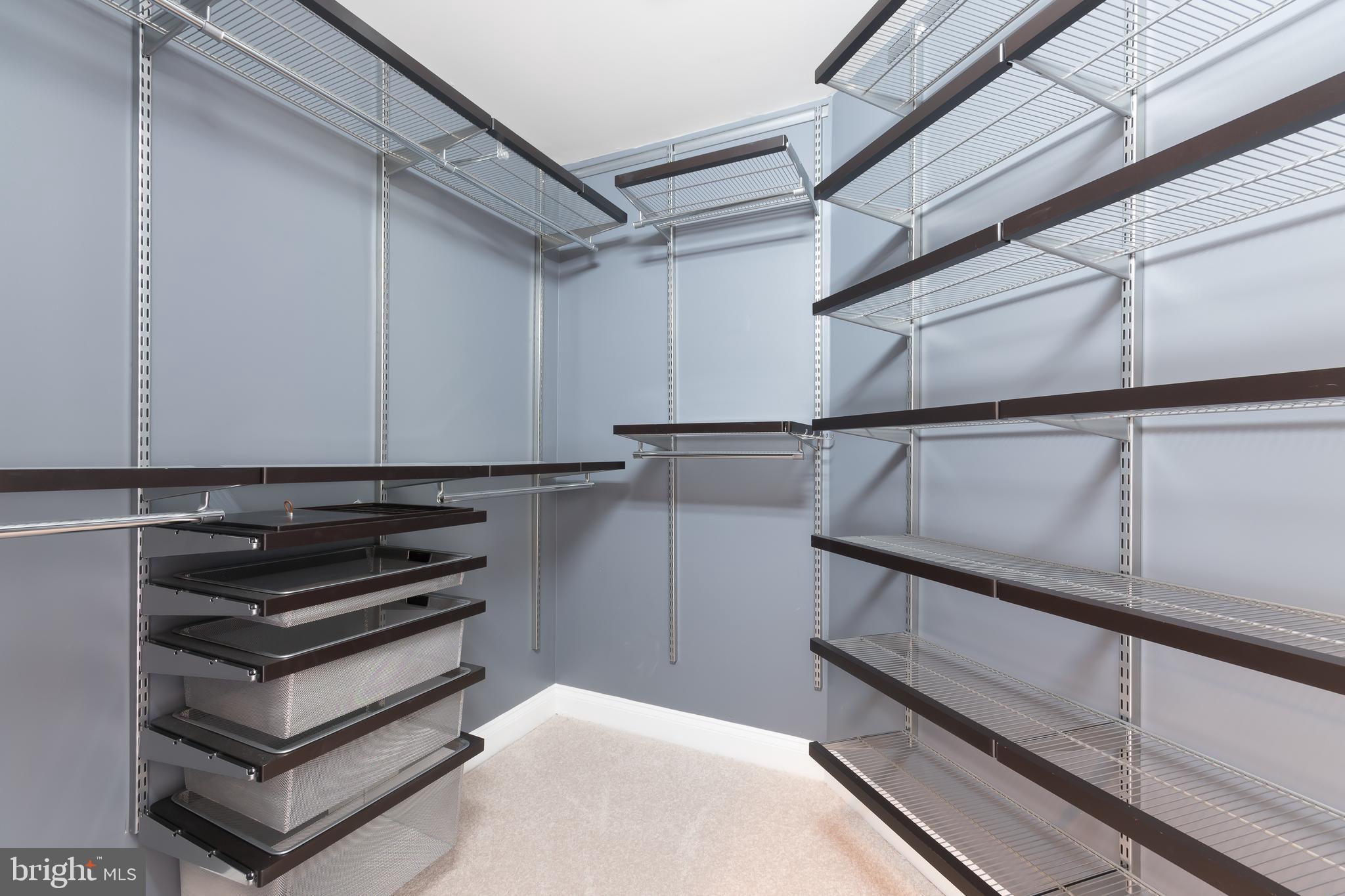 43268 Hillhead Place Leesburg, VA 20176 - Photo 22 of 53 a view of storage and utility room with racks on the wall