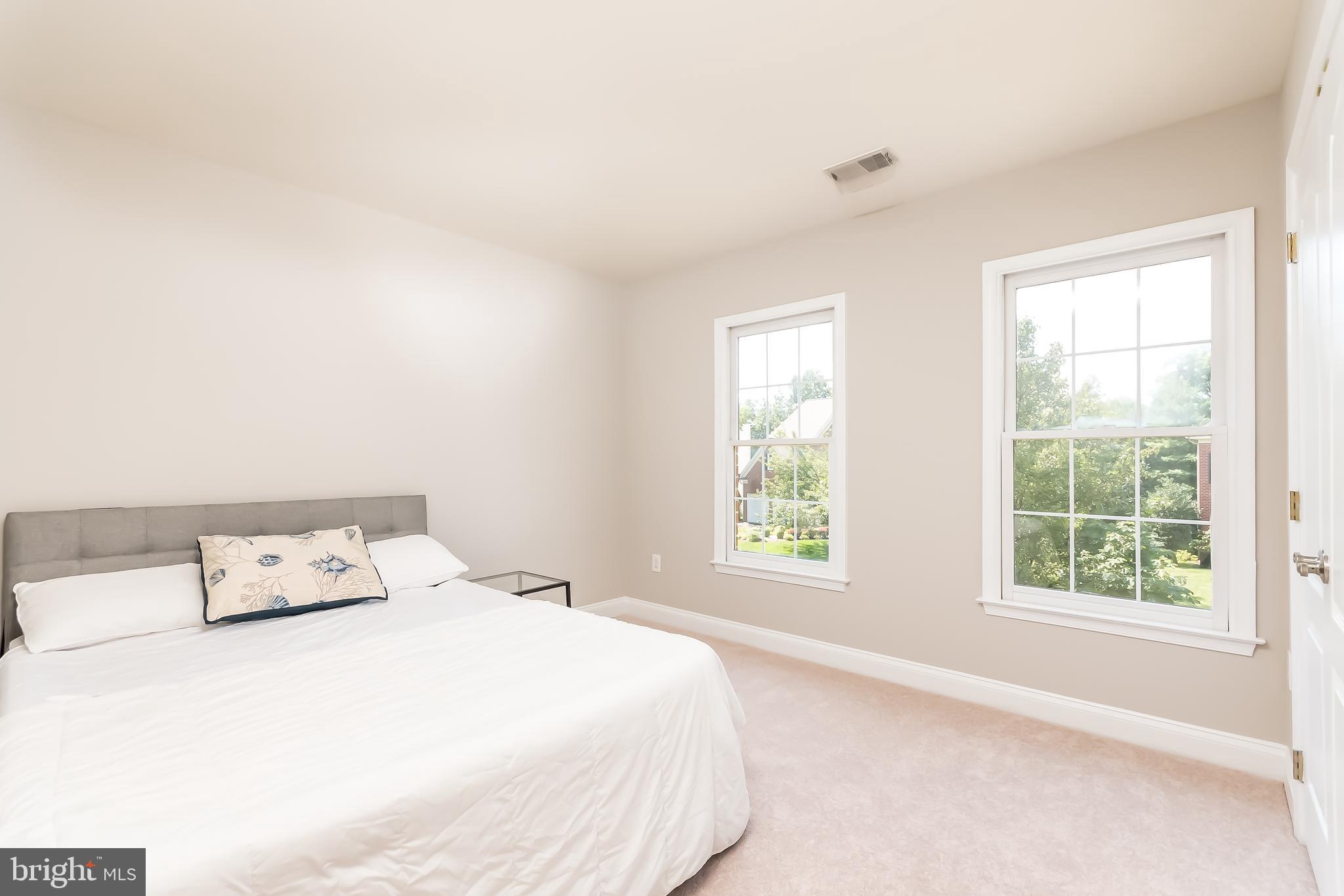 43268 Hillhead Place Leesburg, VA 20176 - Photo 28 of 53 a bedroom with a bed and window