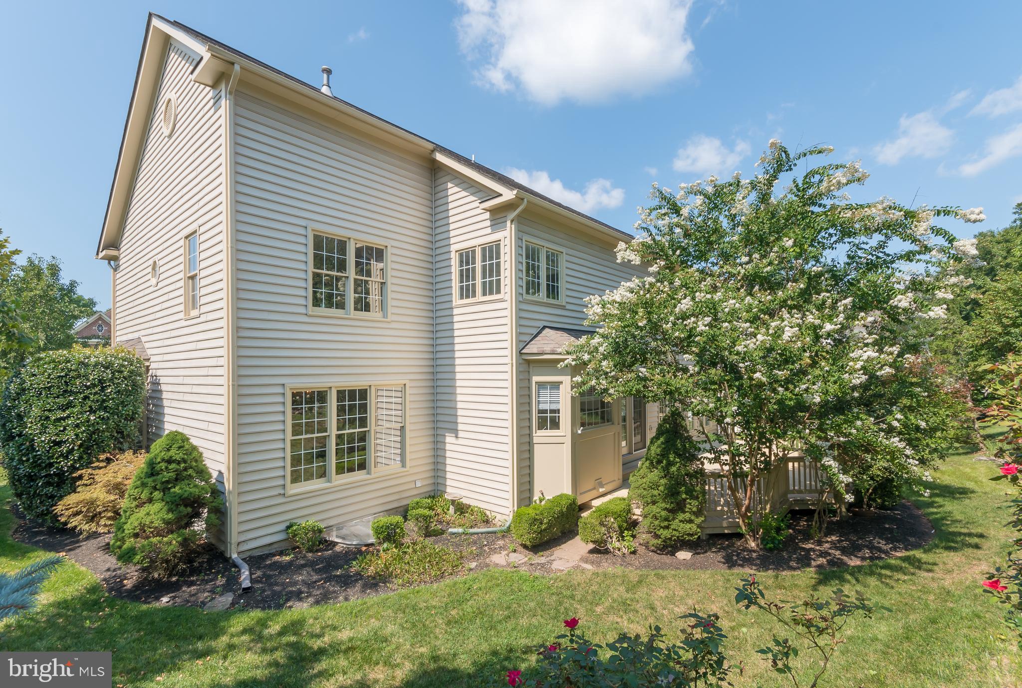 43268 Hillhead Place Leesburg, VA 20176 - Photo 43 of 53 a view of a house with a yard