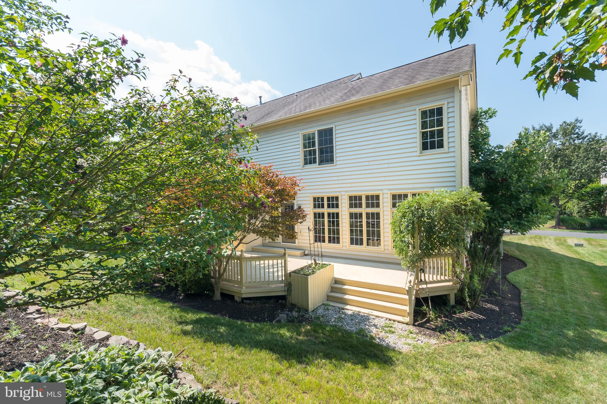 43268 Hillhead Place Leesburg, VA 20176 - Photo 44 of 53 a view of a house with backyard sitting area and swimming pool