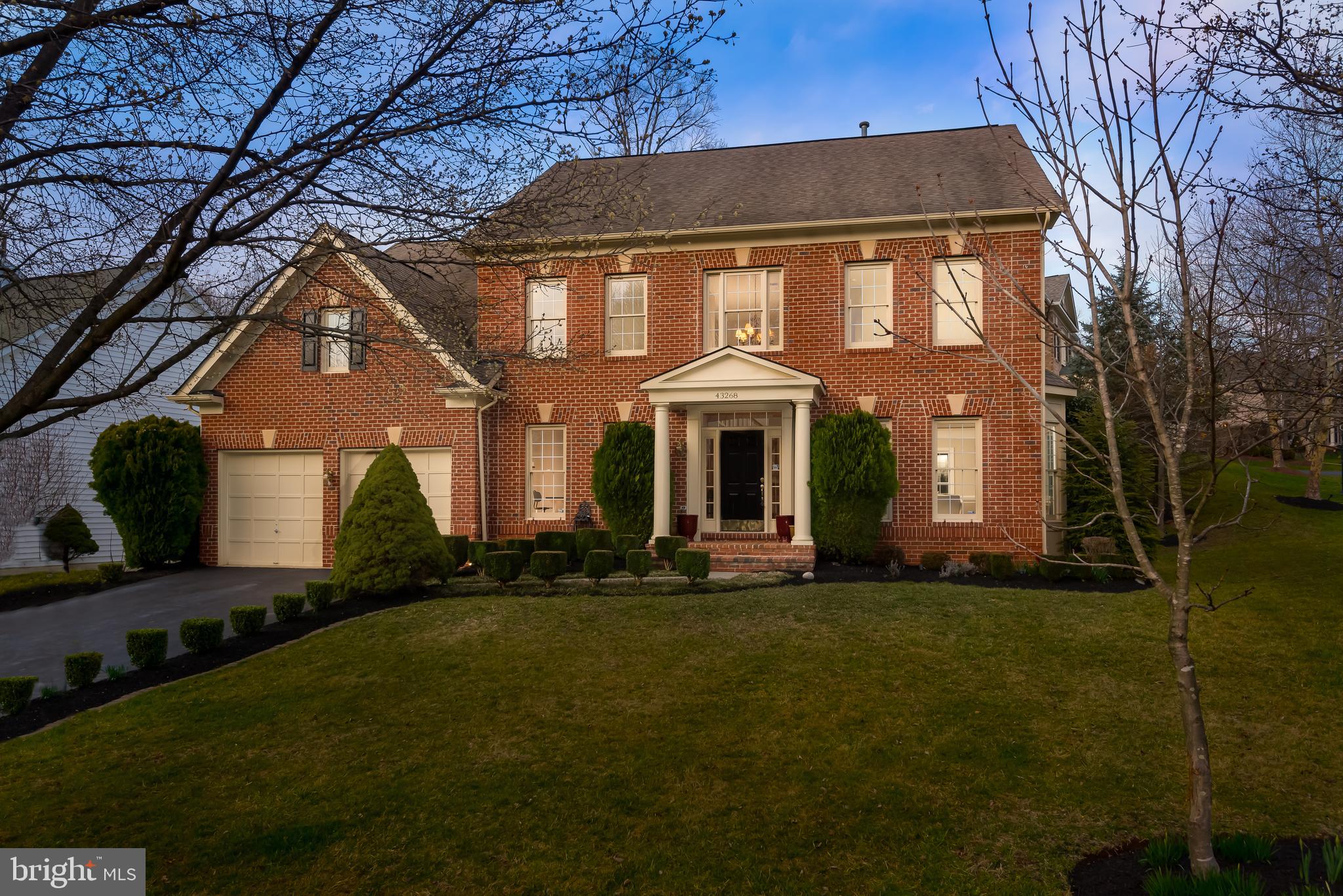 43268 Hillhead Place Leesburg, VA 20176 - Photo 46 of 53 a front view of a house with a yard