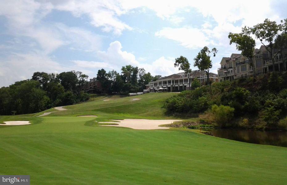 43268 Hillhead Place Leesburg, VA 20176 - Photo 50 of 53 a view of a golf course with a lake