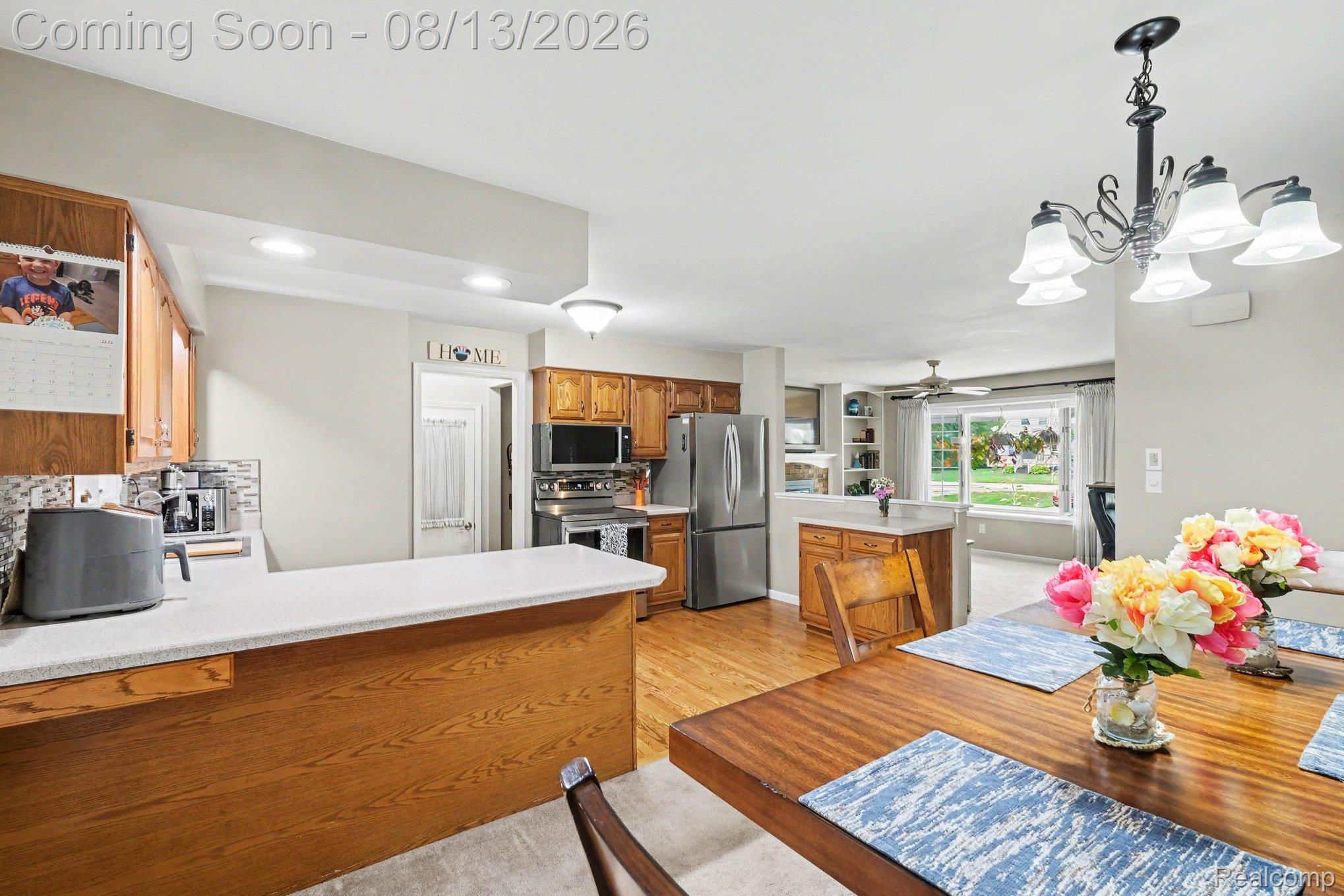 10361 Coldwater Road Flushing, MI 48433 - Photo 9 of 37 Kitchen with wood cabinetry and stainless steel appliances