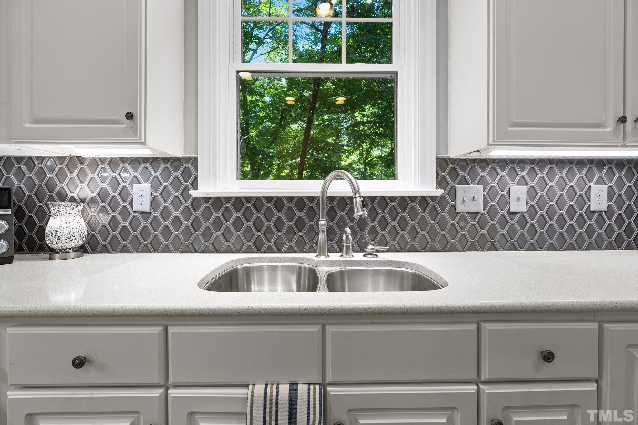 9 Montcrest Drive Durham, NC 27713 - Photo 25 of 43 a close view of sink and tap