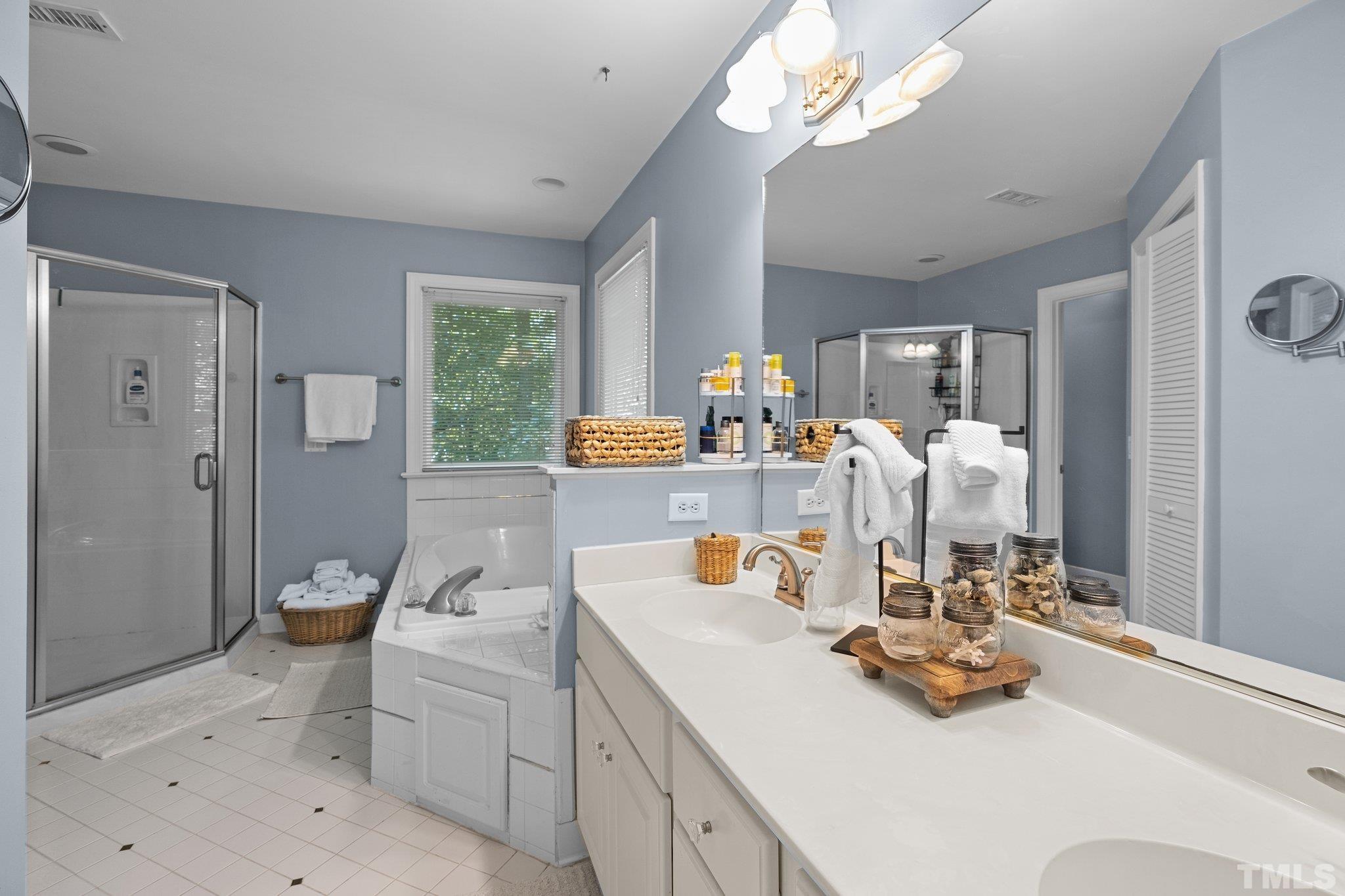 9 Montcrest Drive Durham, NC 27713 - Photo 31 of 43 a living room with furniture and a chandelier