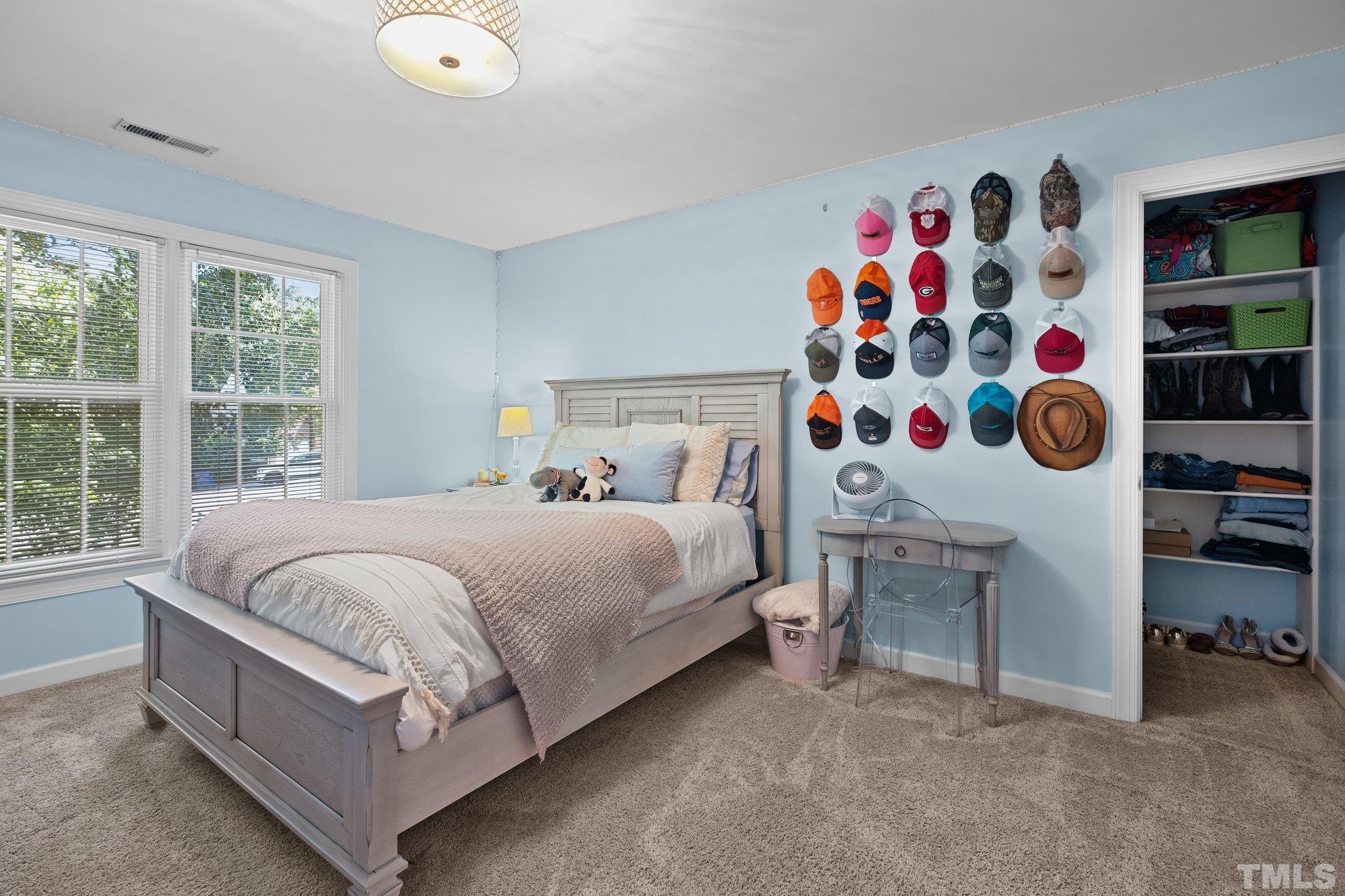 9 Montcrest Drive Durham, NC 27713 - Photo 36 of 43 a bedroom with a bed and a window