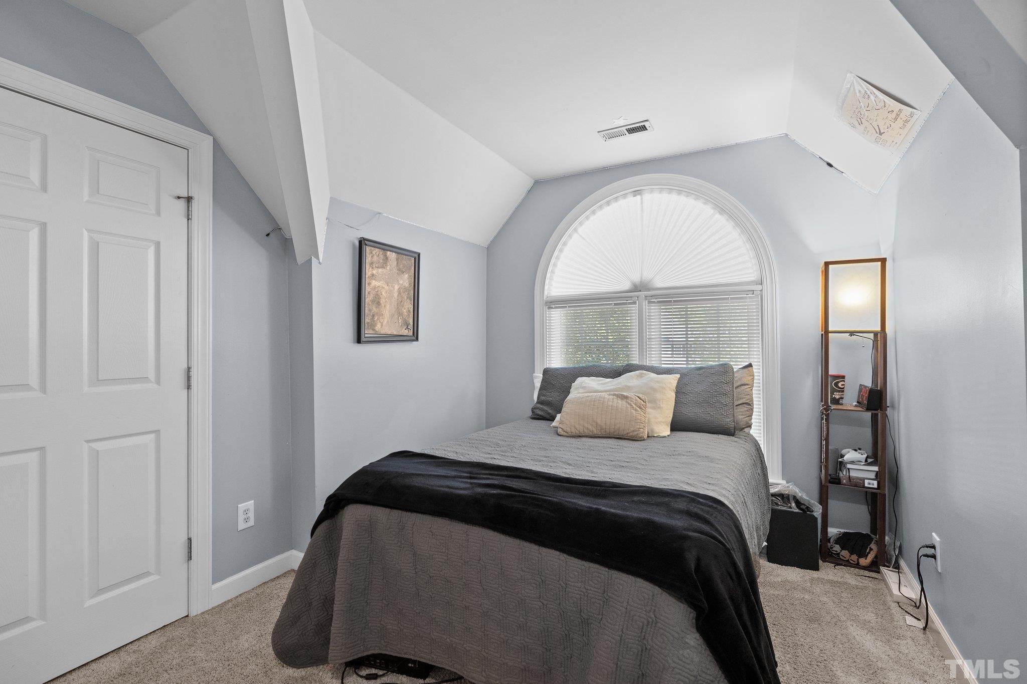 9 Montcrest Drive Durham, NC 27713 - Photo 38 of 43 a bedroom with a bed and a window