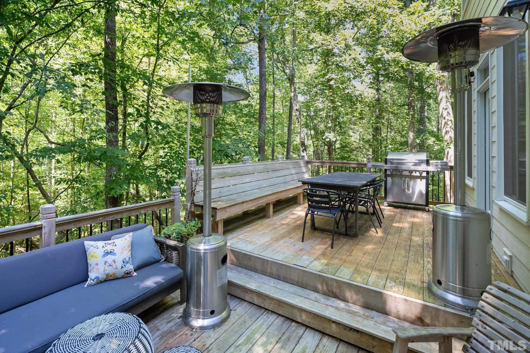 9 Montcrest Drive Durham, NC 27713 - Photo 39 of 43 a roof deck view with a table and chairs and potted plants