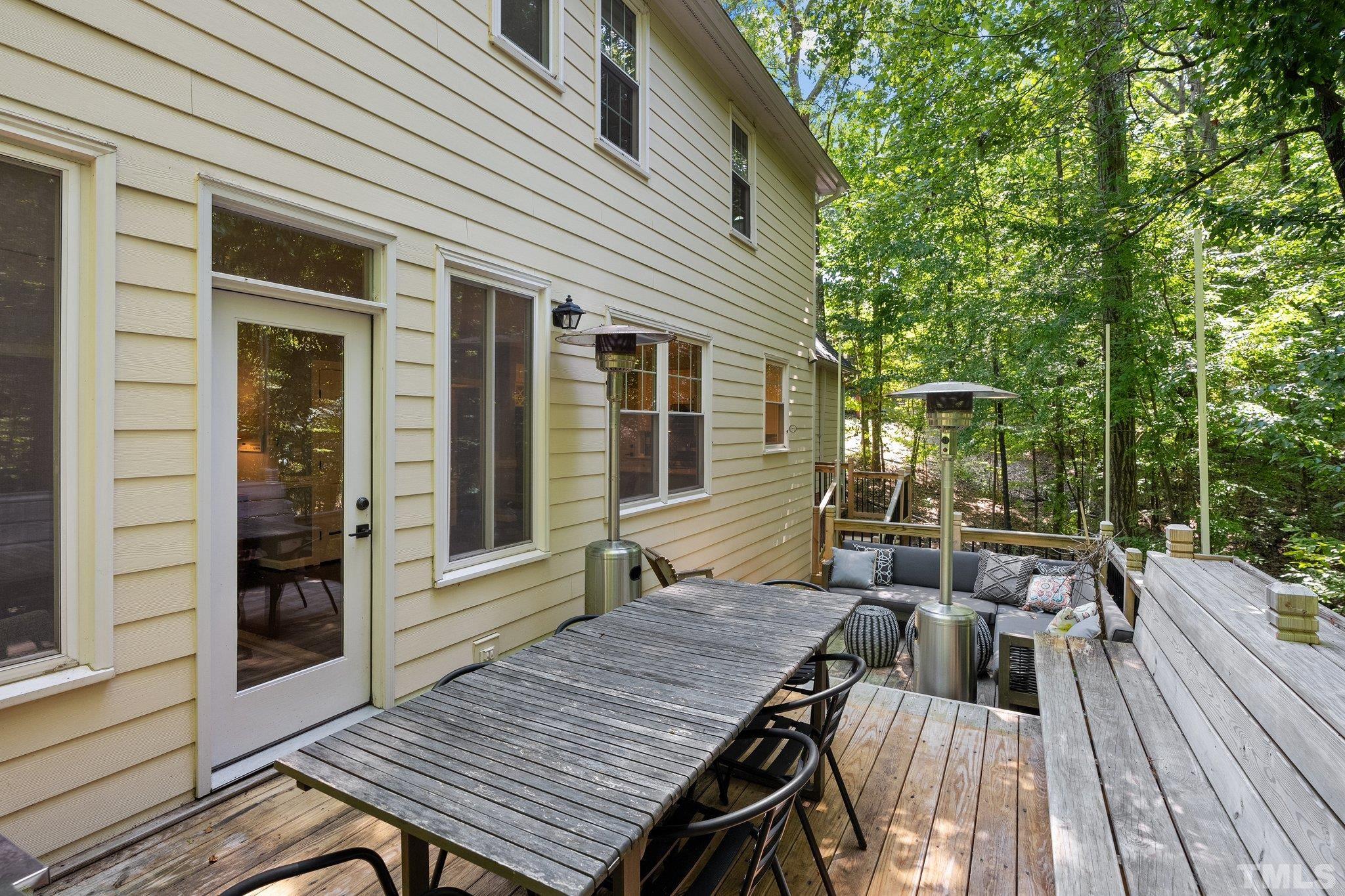 9 Montcrest Drive Durham, NC 27713 - Photo 41 of 43 a view of a wooden chairs and table in the balcony