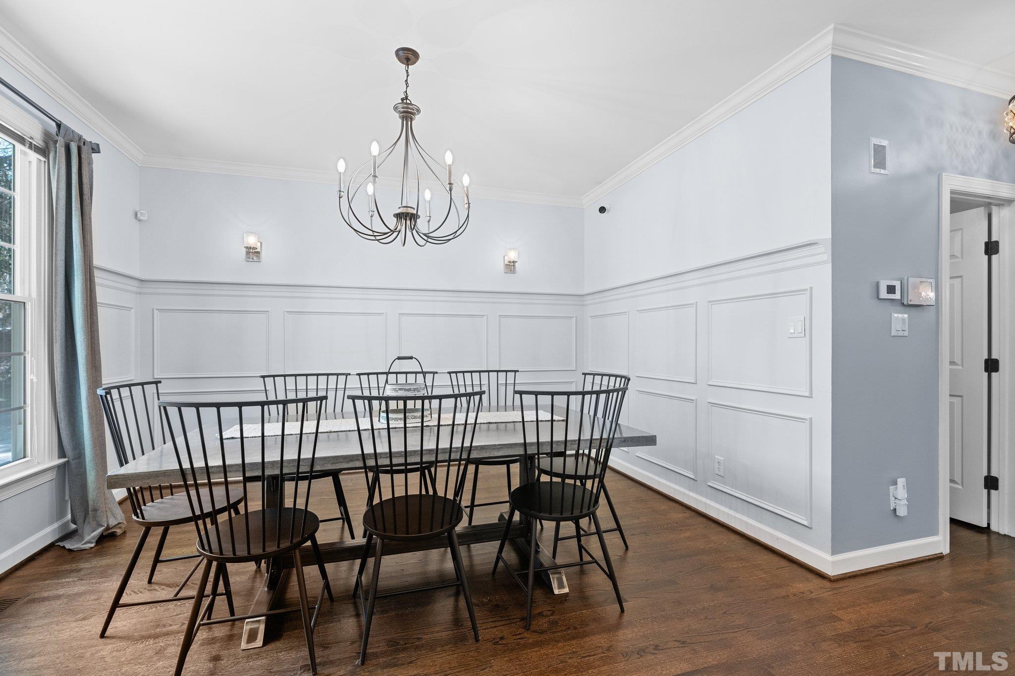 9 Montcrest Drive Durham, NC 27713 - Photo 5 of 43 a view of a dining room with furniture wooden floor and chandelier
