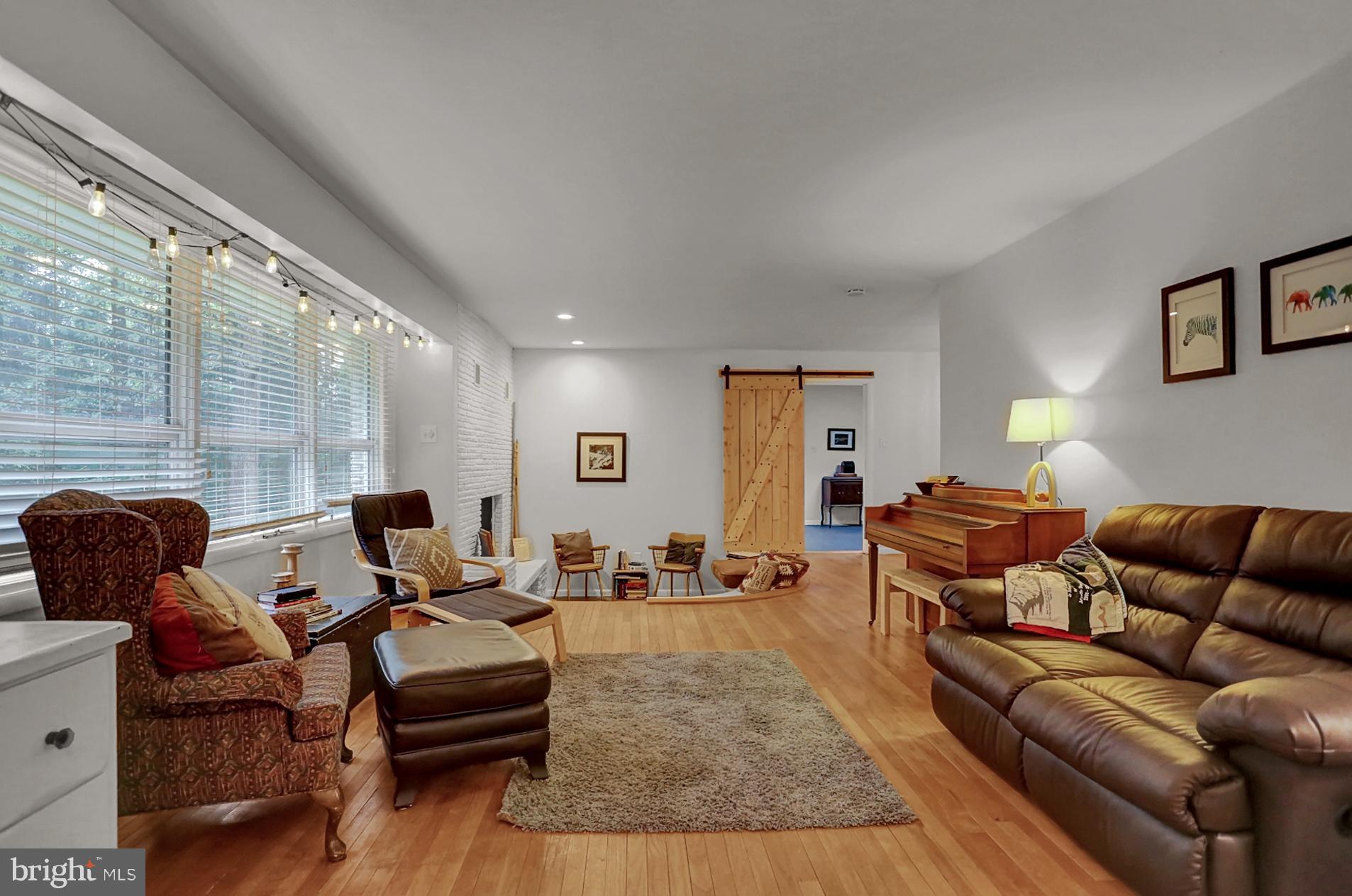141 Stephen Road Reading, PA 19601 - Photo 4 of 39 Open Living Area w/Hardwood Floor