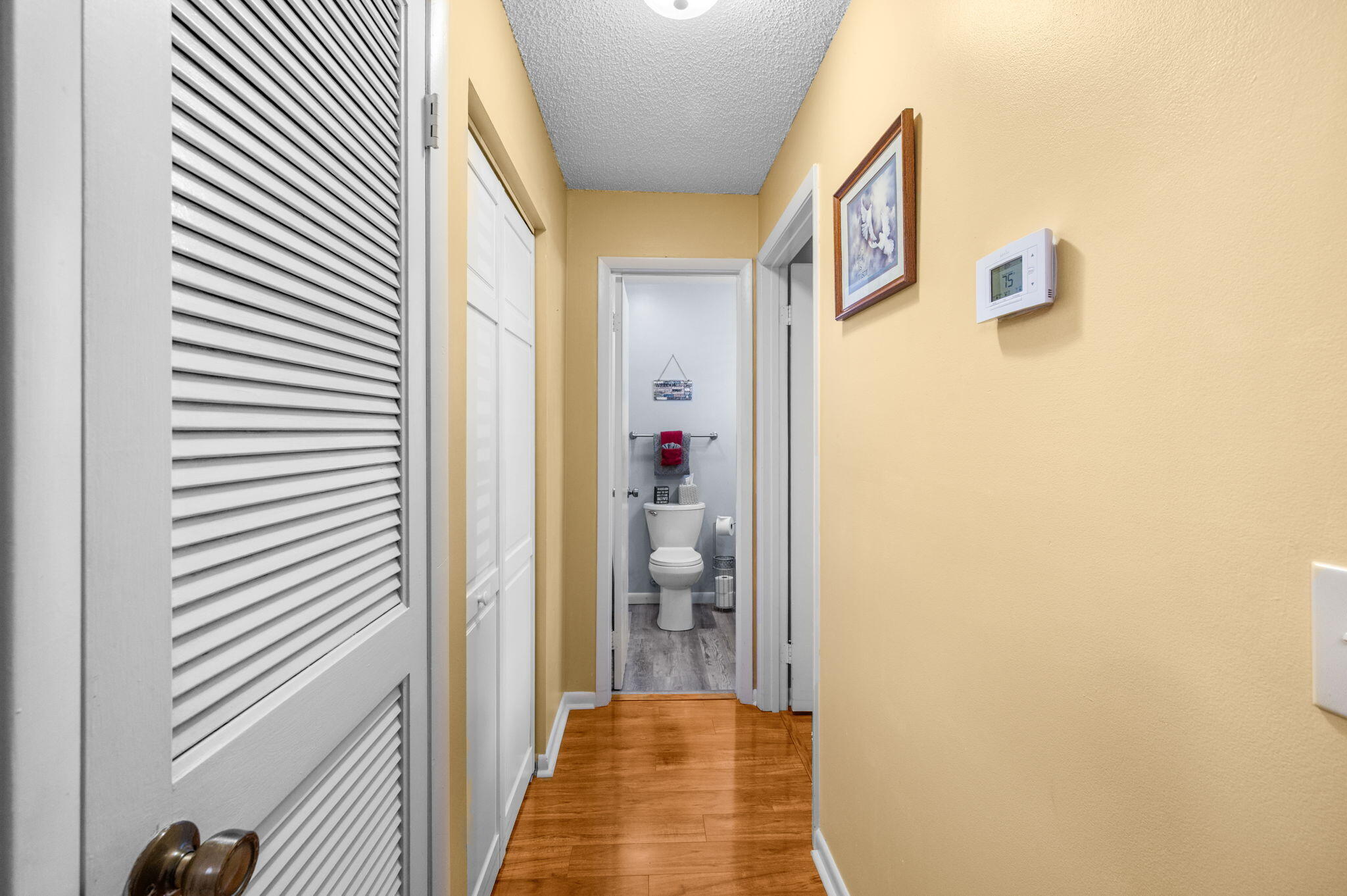 830 Timberview Drive, Unit E Fort Pierce, FL 34982 - Photo 9 of 19 Guest BR Hallway