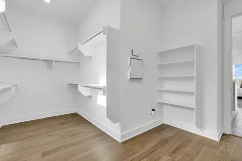 a view of an empty walk in closet
