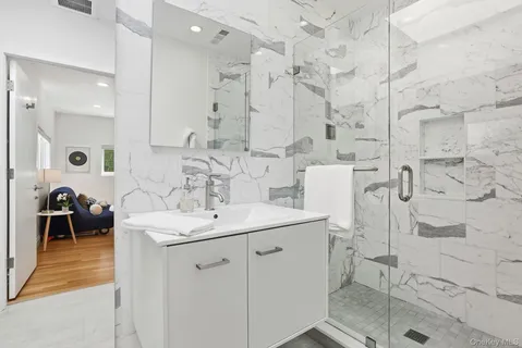 a bathroom with a sink and a mirror