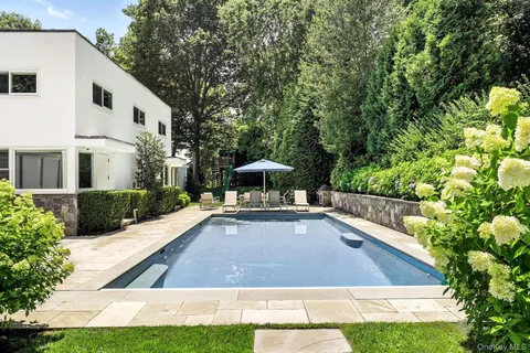 a view of a yard with a patio