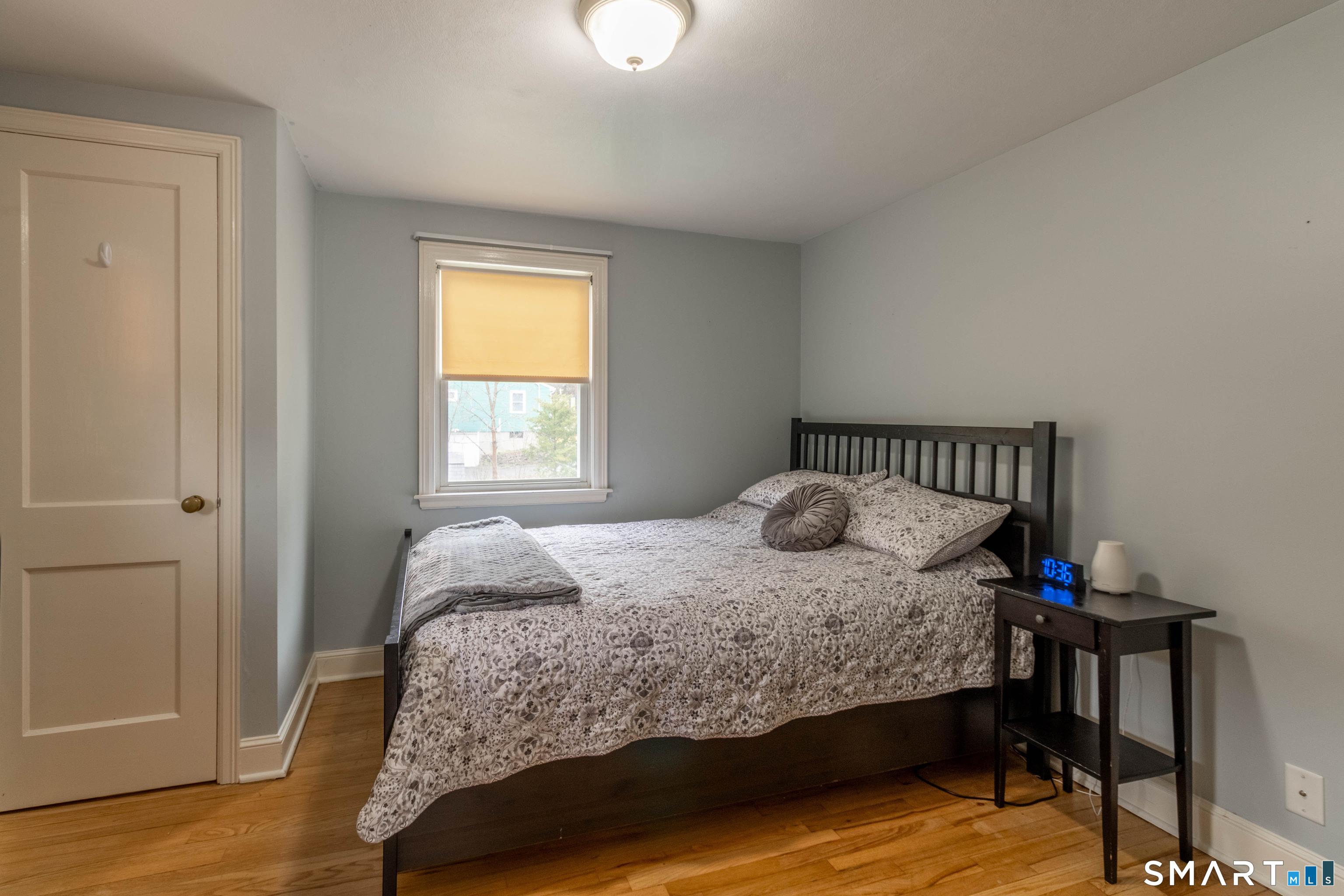 535 Lower Lane Berlin, CT 06037 - Photo 22 of 40 a bedroom with a bed and a window