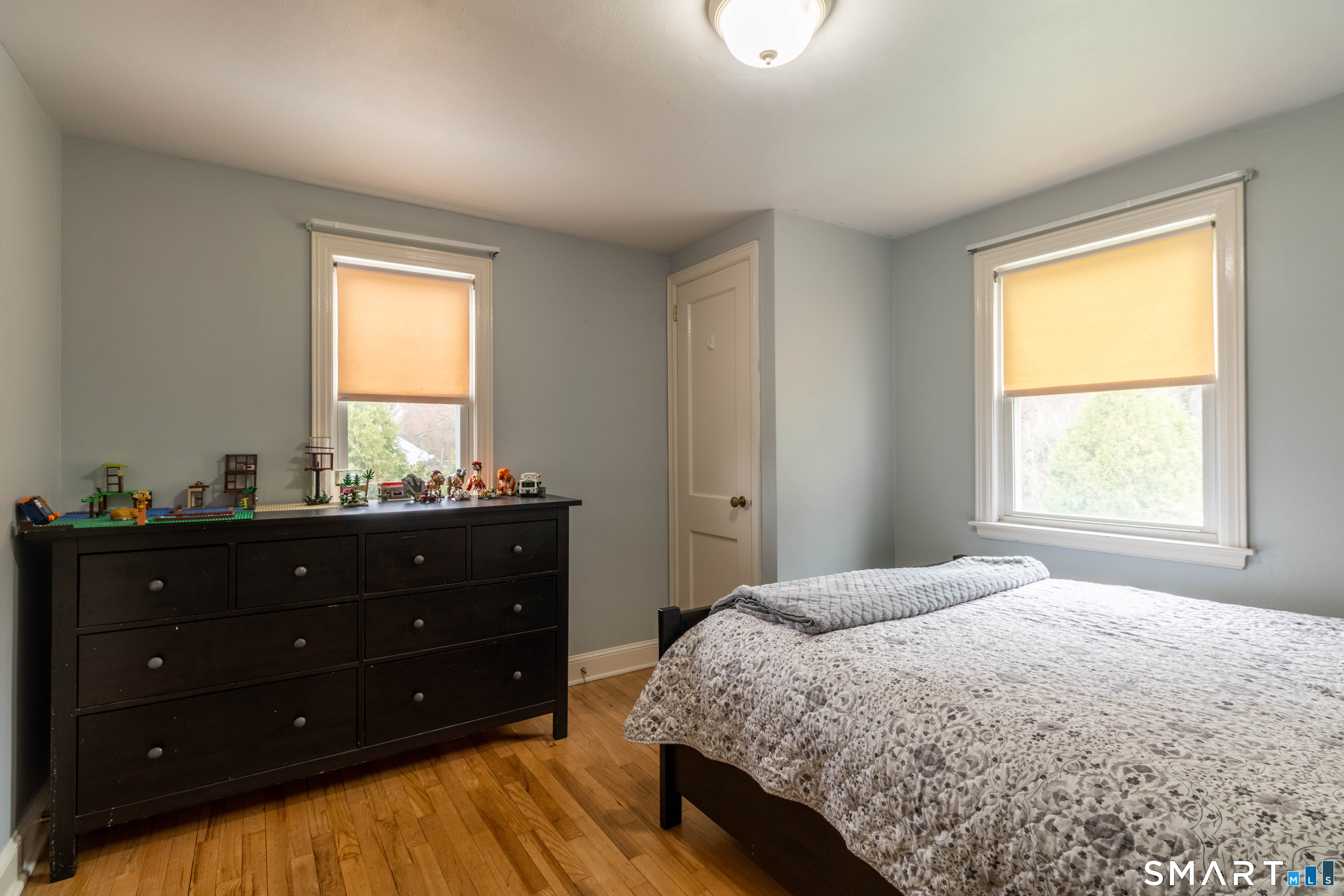 535 Lower Lane Berlin, CT 06037 - Photo 23 of 40 a bedroom with a bed and a window