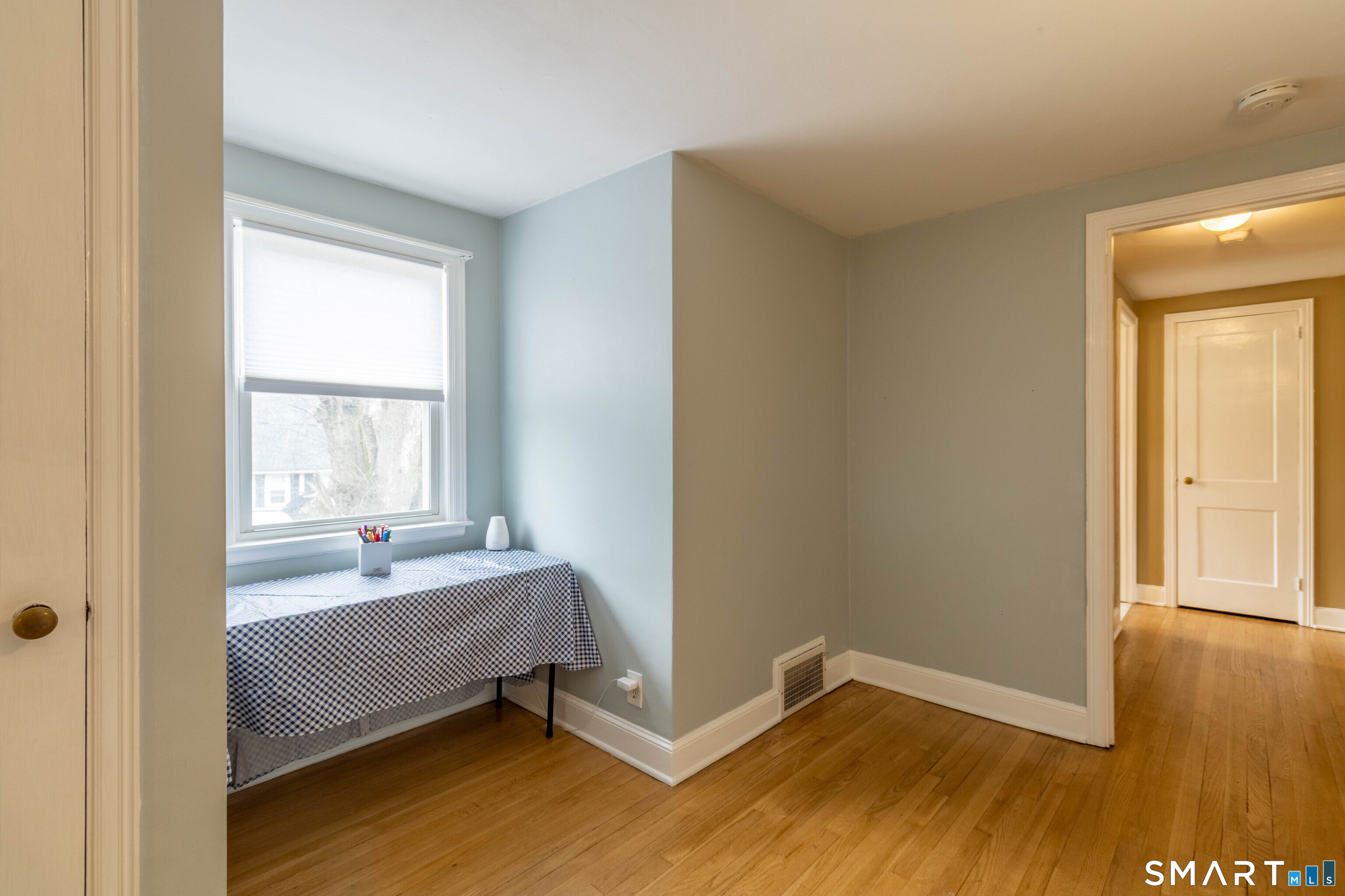 535 Lower Lane Berlin, CT 06037 - Photo 26 of 40 a bed room with a bed and a window