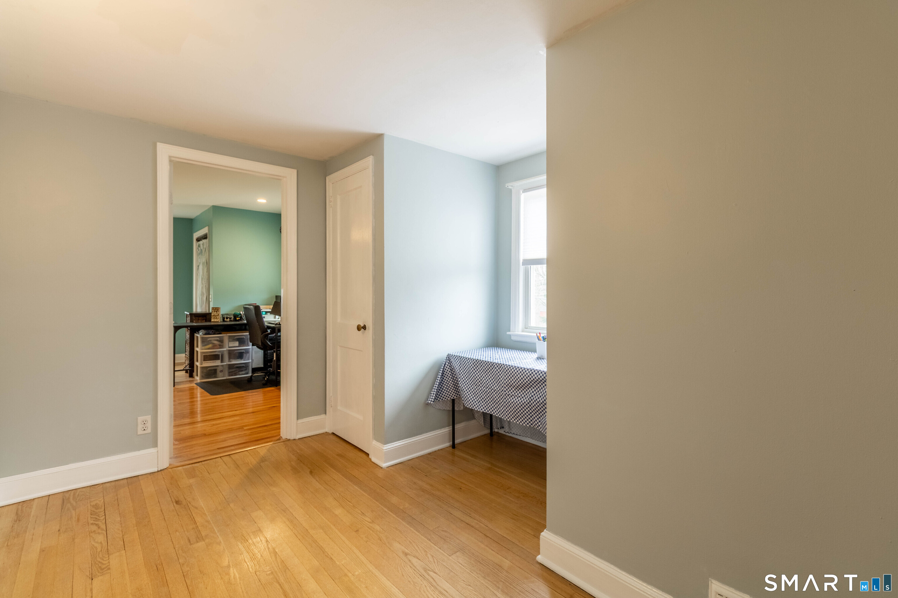 535 Lower Lane Berlin, CT 06037 - Photo 27 of 40 a view of a livingroom with a chair and front door