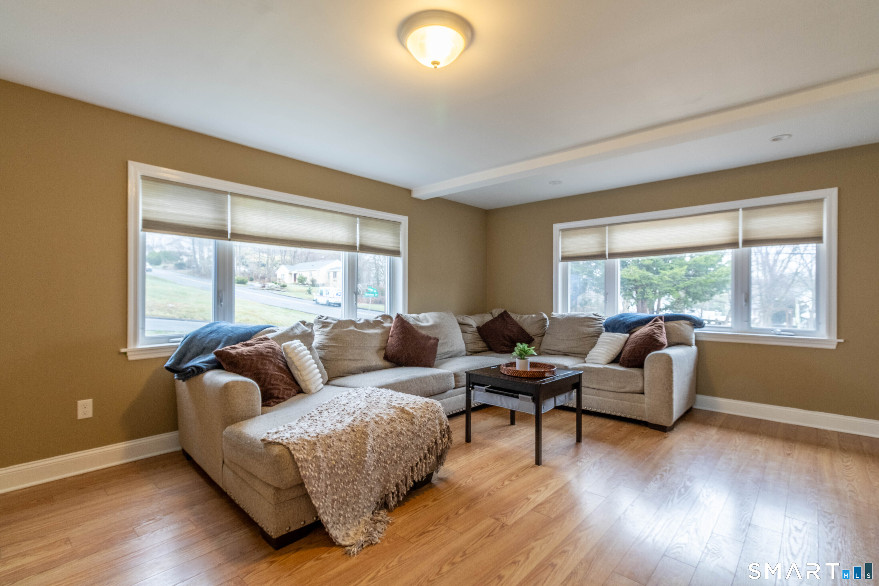 535 Lower Lane Berlin, CT 06037 - Photo 10 of 40 a living room with furniture and a large window