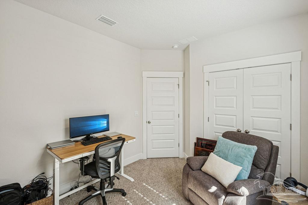 5659 Blake Lane Pace, FL 32571 - Photo 25 of 38 a workspace with furniture and a window