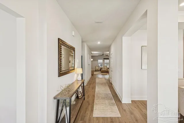 a view of a hallway with a couch
