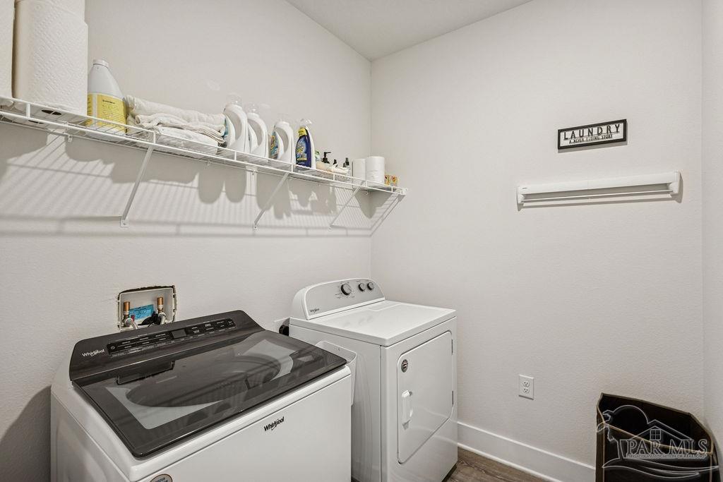 5659 Blake Lane Pace, FL 32571 - Photo 30 of 38 a utility room with dryer and washer