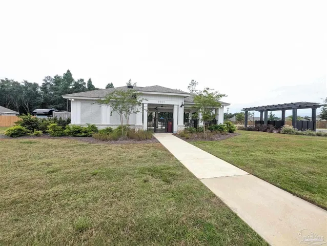 a front view of house with yard