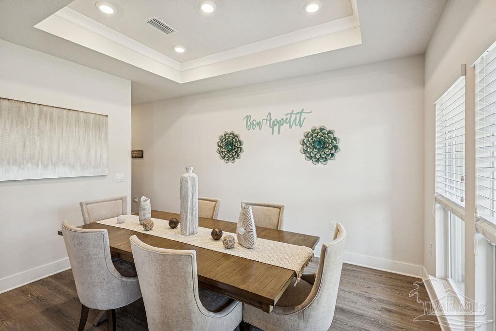 5659 Blake Lane Pace, FL 32571 - Photo 5 of 38 a view of a dining room with furniture window and wooden floor
