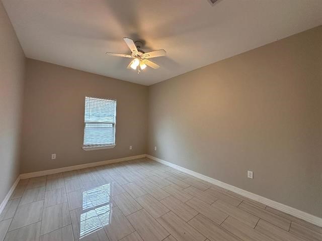 6385 Highpoint Avenue Beaumont, TX 77713 - Photo 13 of 20 a view of an empty room with a window