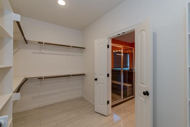 6385 Highpoint Avenue Beaumont, TX 77713 - Photo 14 of 20 a view of an empty walk in closet