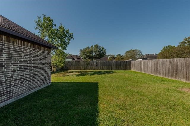 6385 Highpoint Avenue Beaumont, TX 77713 - Photo 16 of 20 a view of a back yard