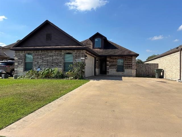 6385 Highpoint Avenue Beaumont, TX 77713 - Photo 20 of 20 a front view of a house with a yard
