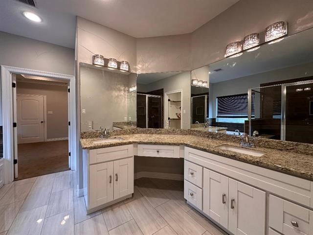 6385 Highpoint Avenue Beaumont, TX 77713 - Photo 8 of 20 a spacious bathroom with a granite countertop sink mirror and double
